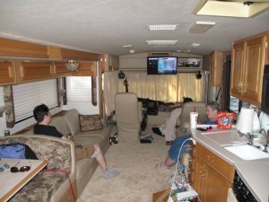 The Diesel engine is in the back, so the door is next to the passenger seat, leaving room for two facing couches.